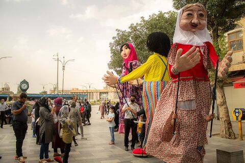 Tall Puppets in Iran Streets