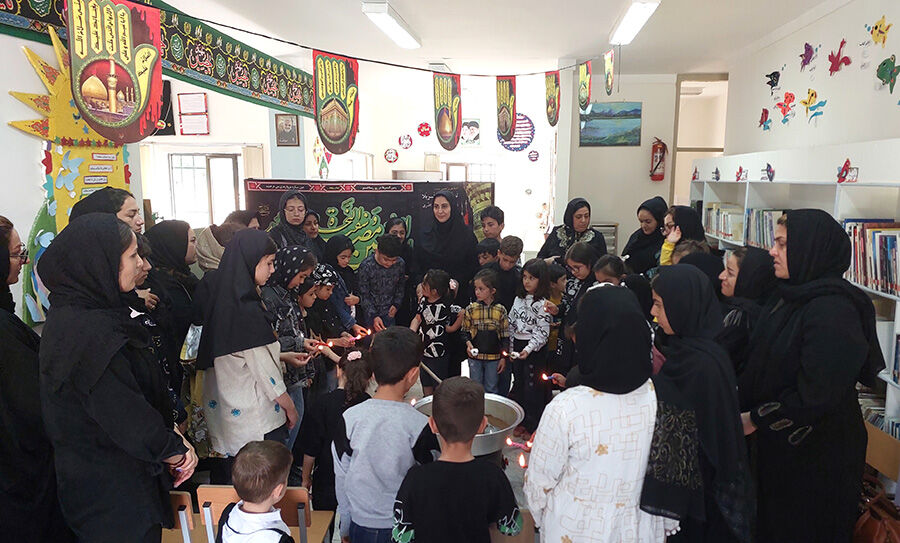 طبخ و توزیع حلوای نذری در کانون انگوت