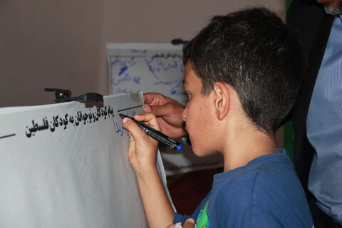 گزارش تصویری از راهپیمایی روز جهانی قدس با برپایی میز خدمت فرهنگی کانون