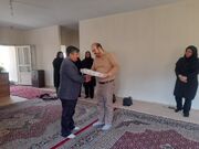 تقدیر و تجلیل مدیرکل کانون استان مرکزی از کارمند ایثارگر و فرزند شهید