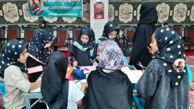 میز خدمت و غرفه عفاف و حجاب در مراسم پرفیض نماز جمعه شهر زاویه