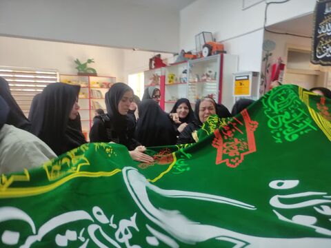 پرچم متبرک بارگاه حضرت علی علیه‌السلام در مرکز فرهنگی، هنری تایباد