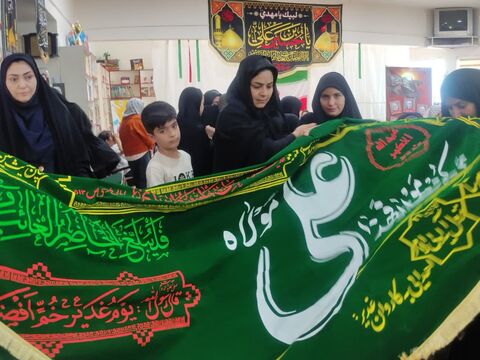 پرچم متبرک بارگاه حضرت علی علیه‌السلام در مرکز فرهنگی، هنری تایباد