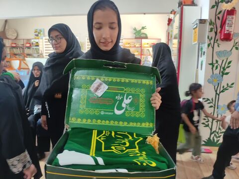 پرچم متبرک بارگاه حضرت علی علیه‌السلام در مرکز فرهنگی، هنری تایباد