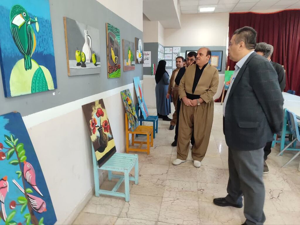 بازگشایی نمایشگاه آثار هنری به مناسبت هفته دفاع مقدس در مرکز روانسر