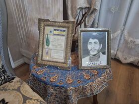 دیدار مشاور مدیرعامل کانون کشور و مدیرکل کانون فارس با همسر شهید علی کسائی