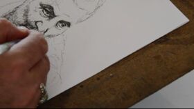 مربی‌ مسئول مرکز شماره ۳ اسلام‌آباد غرب چهره حاج‌قاسم را طراحی کرد