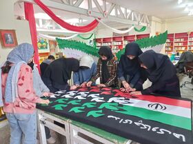 گزارش تصویری/ حال و هوای دهه فجر از فضاسازی تا نصب پرچم در مراکز همدان