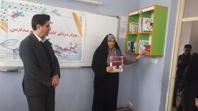 تجهیز مدرسه عزت روستای عشایری گرناویک شهرستان خوی به قفسه کتاب