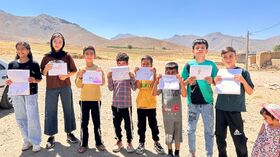 قصه‌نویسی، کتاب‌خوانی و فوتبال؛ یک روز پرنشاط برای کودکان روستای آصف‌آباد قروه