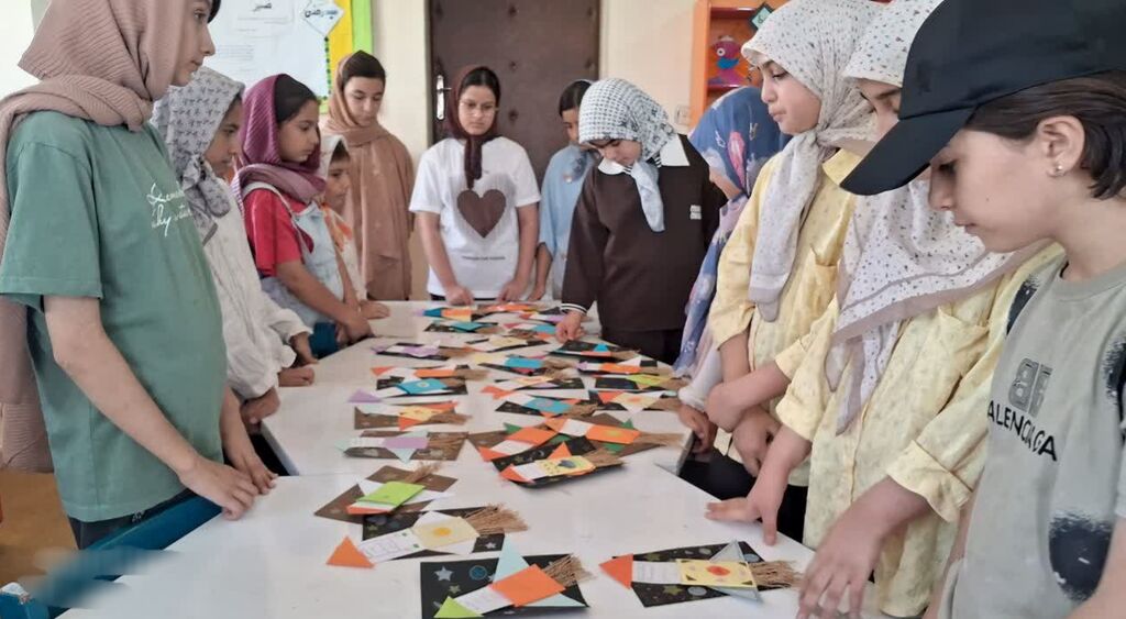 ویژهنامه «کارتپستالسازی» با یاد شهدای کودک در کانون کنگاور برگزار شد