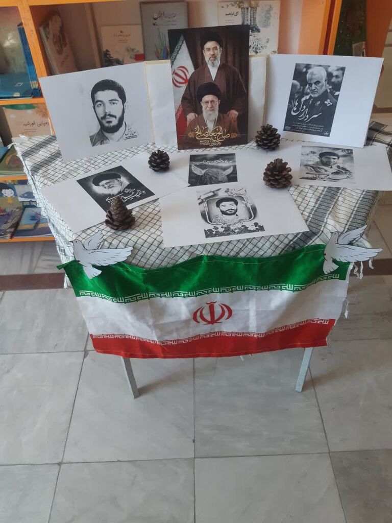 گرامیداشت هفته دفاع مقدس و یادبود شهدای دبستان شجره طیبه میناب در مرکز بیستون